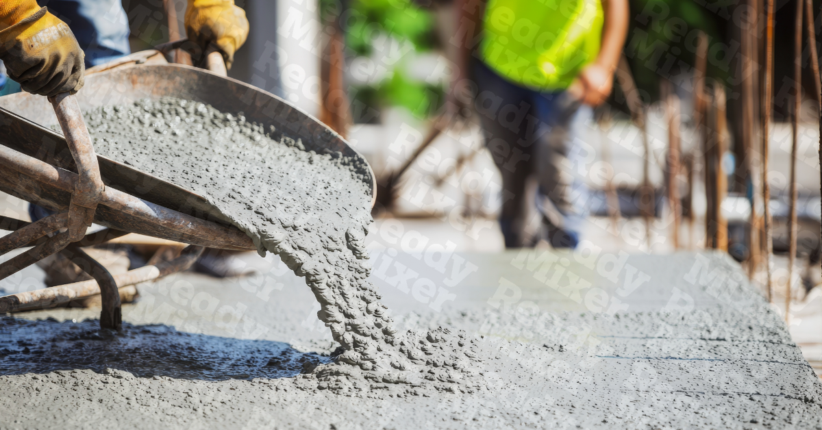 Pouring concrete from a wheel barrow